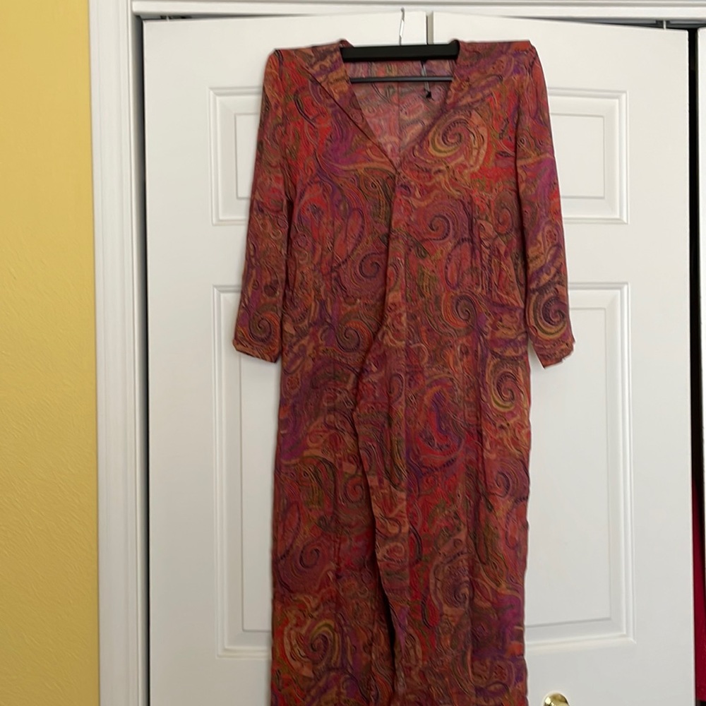 Peruvian connection wrap dress with snap to keep neckline from comin open